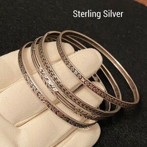 Four Sterling Silver Bangle Bracelets